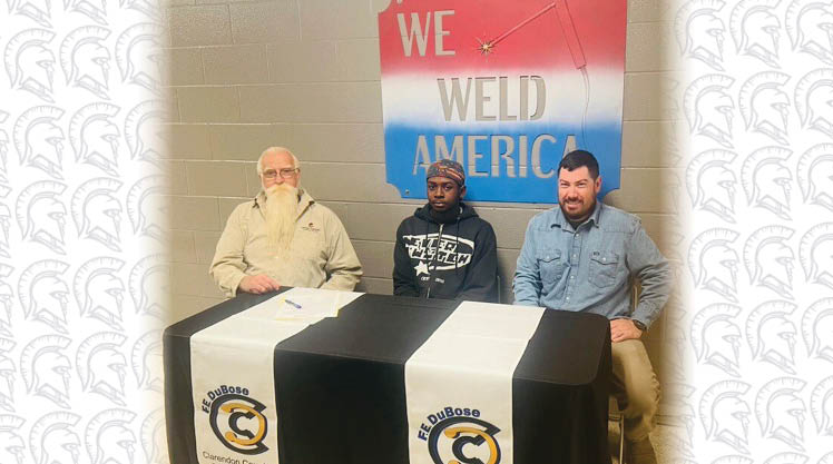 Welding Work-based learning Signing Day with Welding program manager Axel Reis and instructor Lucas Bishop.